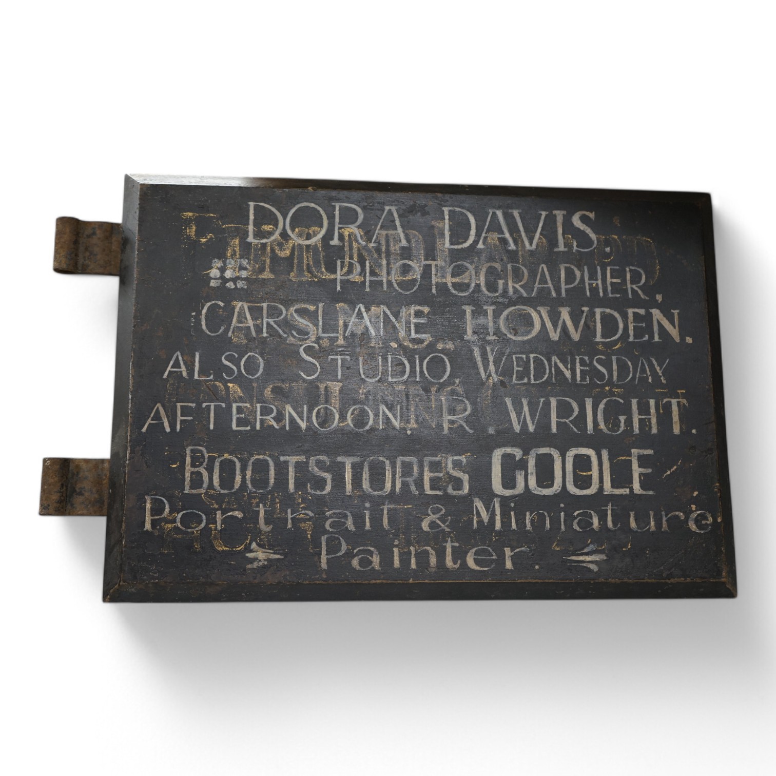 An early to mid 20th century painted shop sign, ‘Dora Davis. Photographer…’, 29x47cm. Condition - fair to good